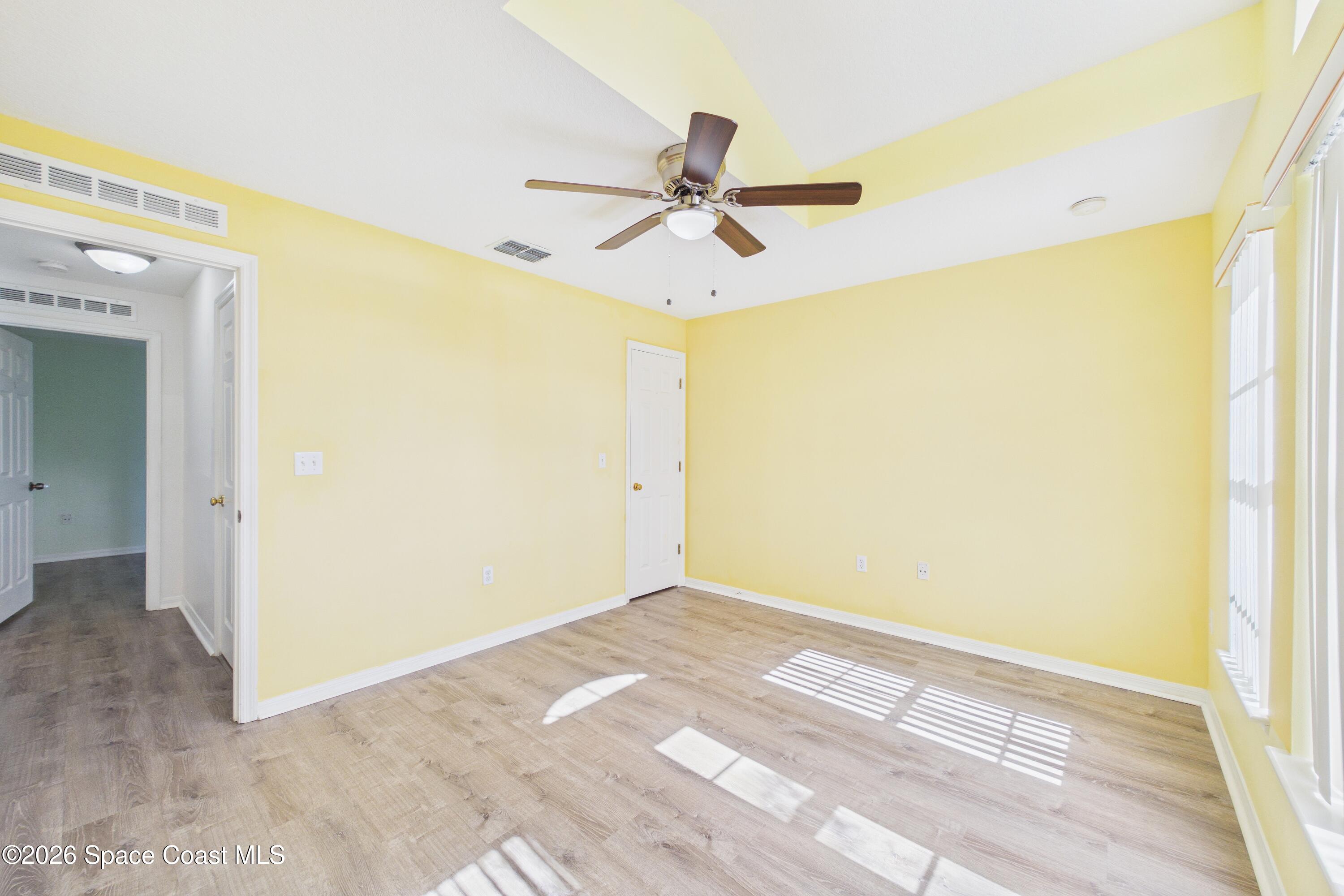 183 Stony Point Drive Sebastian, FL 32958 - Photo 12 of 27 a view of a big room with wooden floor
