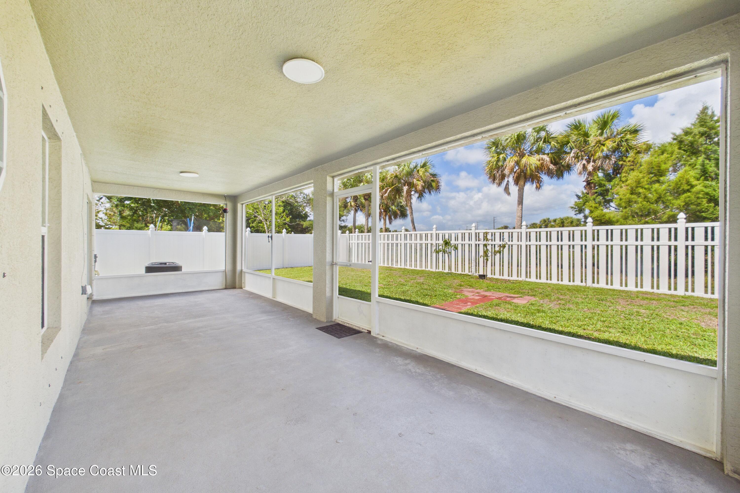 183 Stony Point Drive Sebastian, FL 32958 - Photo 19 of 27 a view of outdoor space with wooden floor and fence