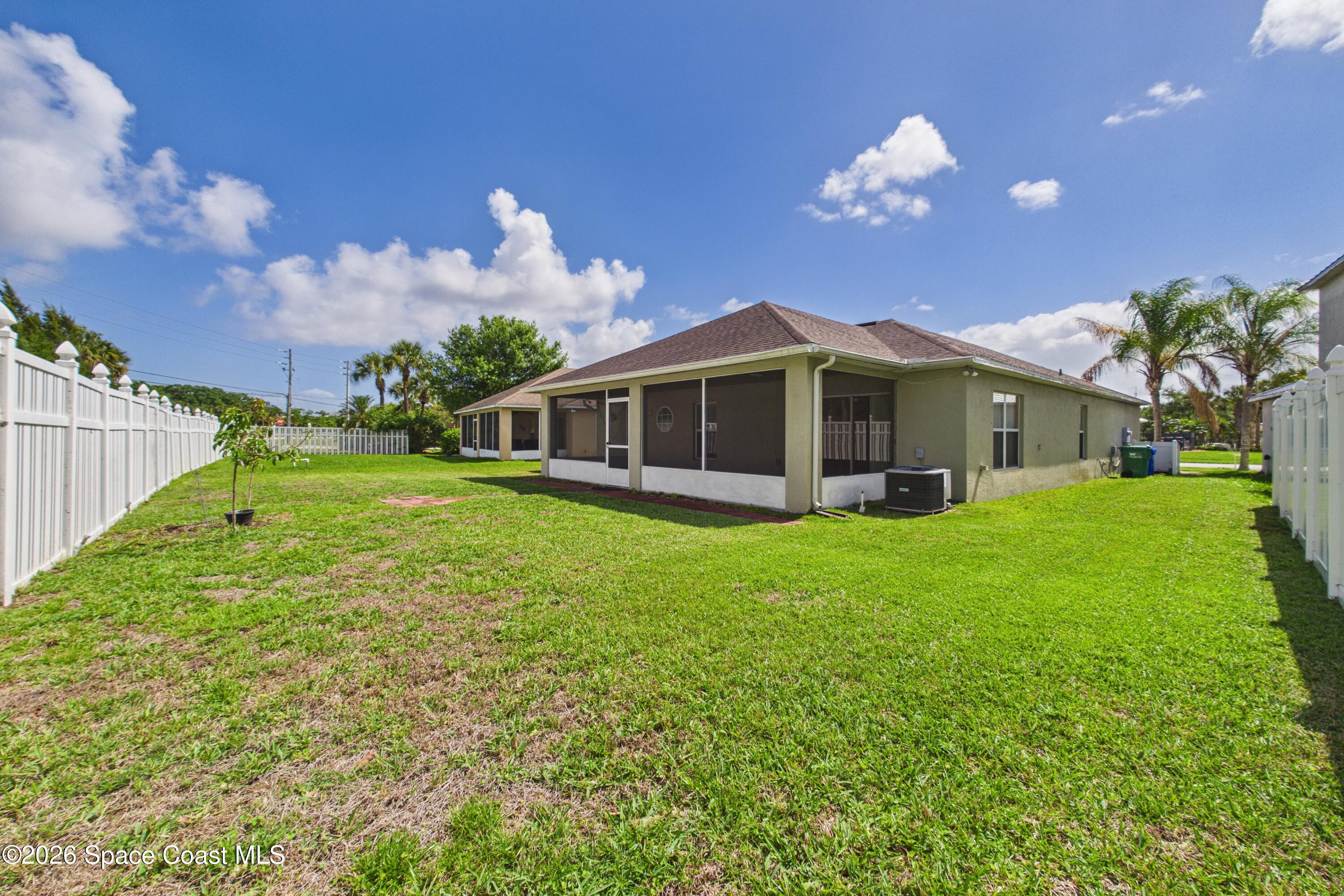 183 Stony Point Drive Sebastian, FL 32958 - Photo 4 of 27 a view of a house with a backyard