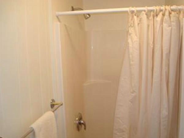 35 Ruthellen Road Framingham, MA 01701 - Photo 24 of 24 a bathroom with a shower curtain