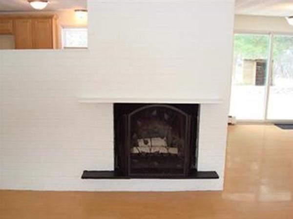 35 Ruthellen Road Framingham, MA 01701 - Photo 10 of 24 a living room with a fireplace