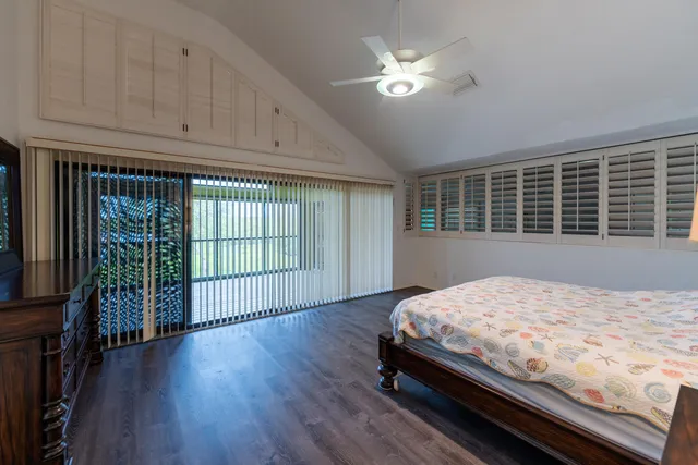 a room with gym equipment and a large window