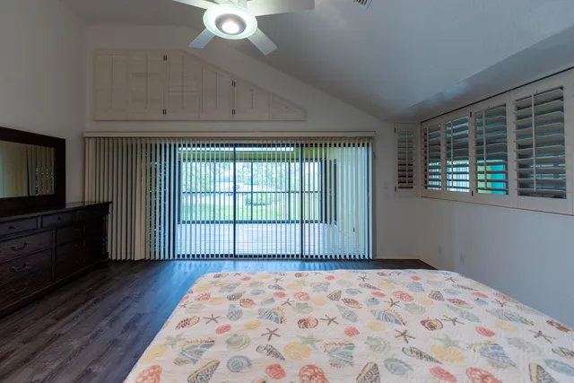 a room with gym equipment and windows