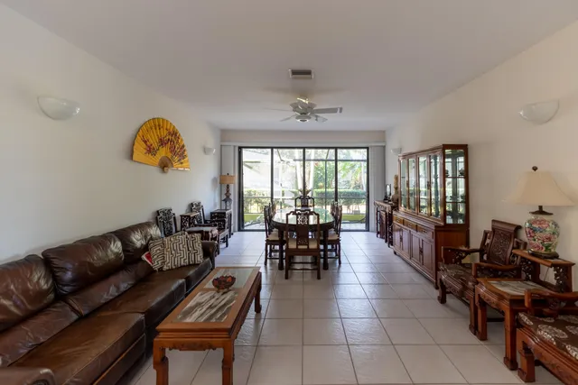 a view of a yard and mountain view in back