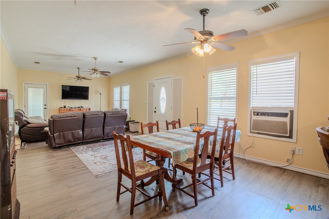 705 West Ash Street Edna, TX 77957 - Photo 8 of 19 a view of a livingroom with furniture and a window