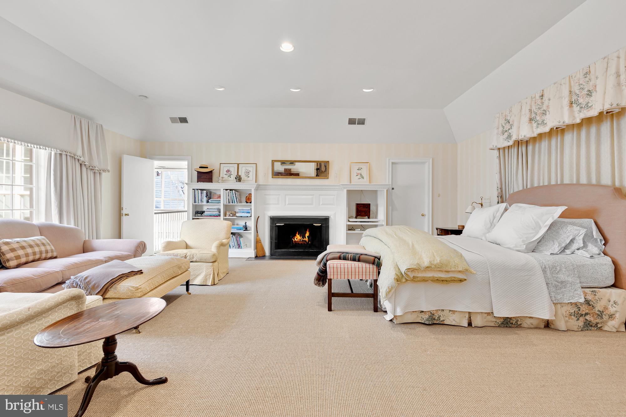10004 Iron Gate Road Potomac, MD 20854 - Photo 29 of 45 Primary Bedroom with Fireplace