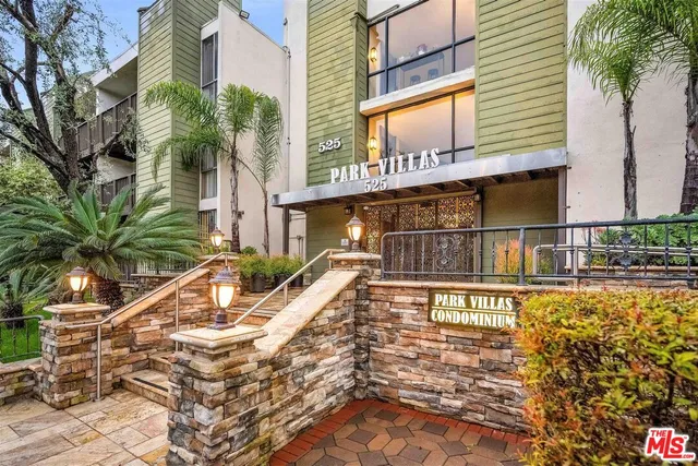 a view of a house with a swimming pool