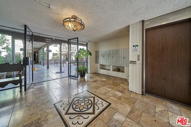 a view of a hallway with a window