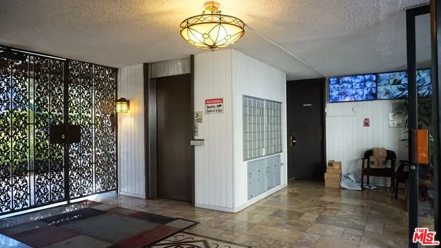 a view of a hallway with elevator