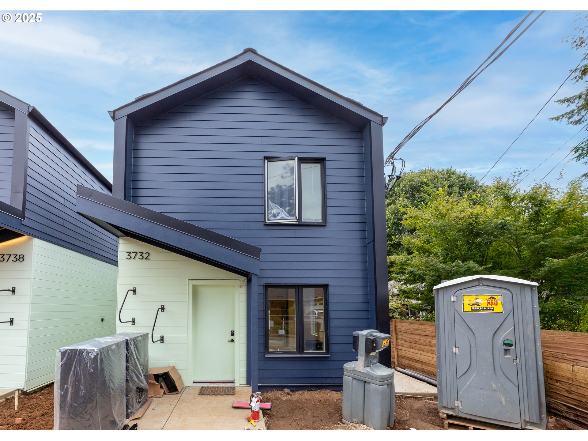 3732 Southeast Harvey Street, Unit 2 Milwaukie, OR 97222 - Photo 1 of 32 a front view of a house with parking area