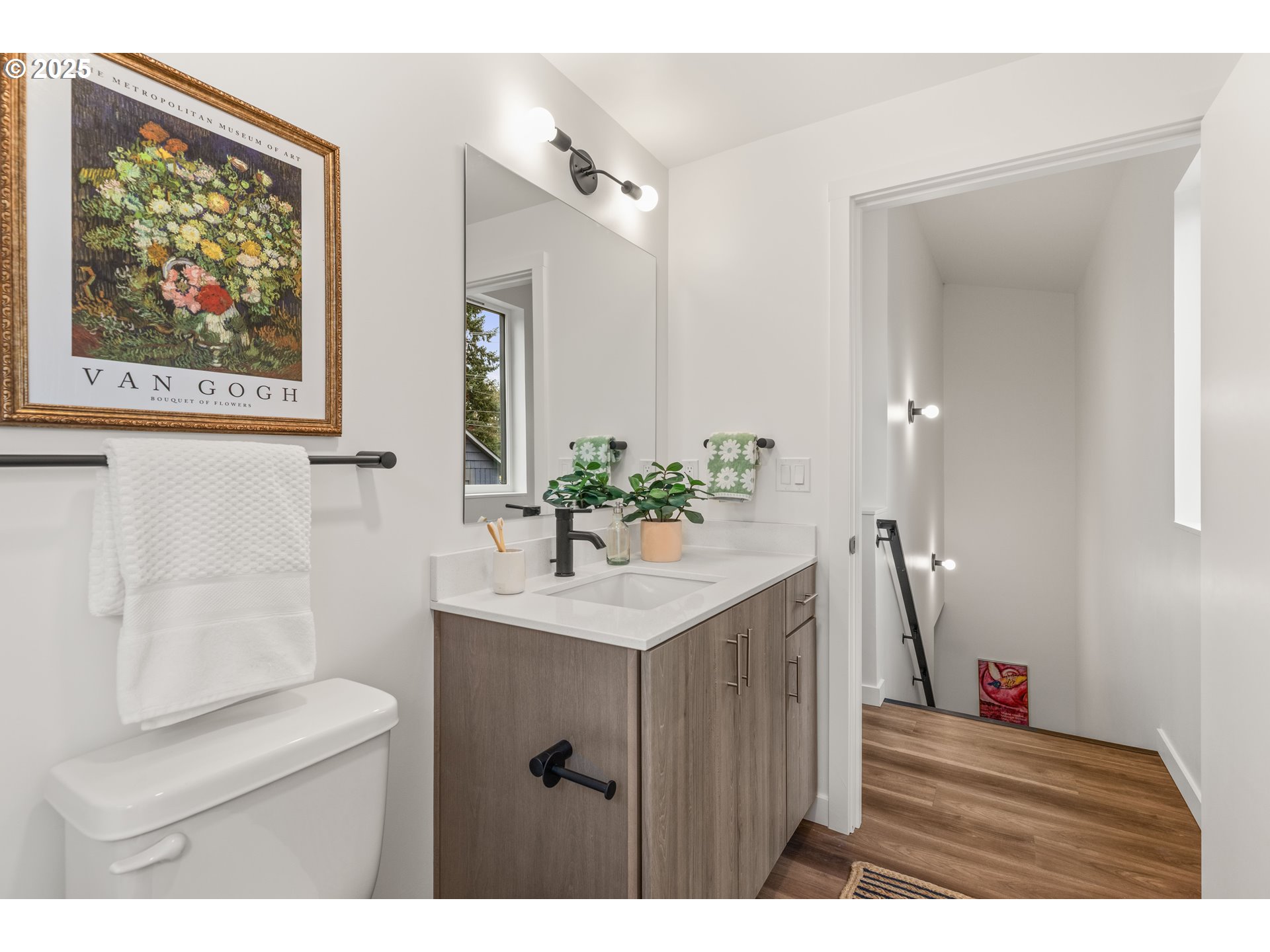 3732 Southeast Harvey Street, Unit 2 Milwaukie, OR 97222 - Photo 14 of 32 a bathroom with a sink vanity granite and a mirror
