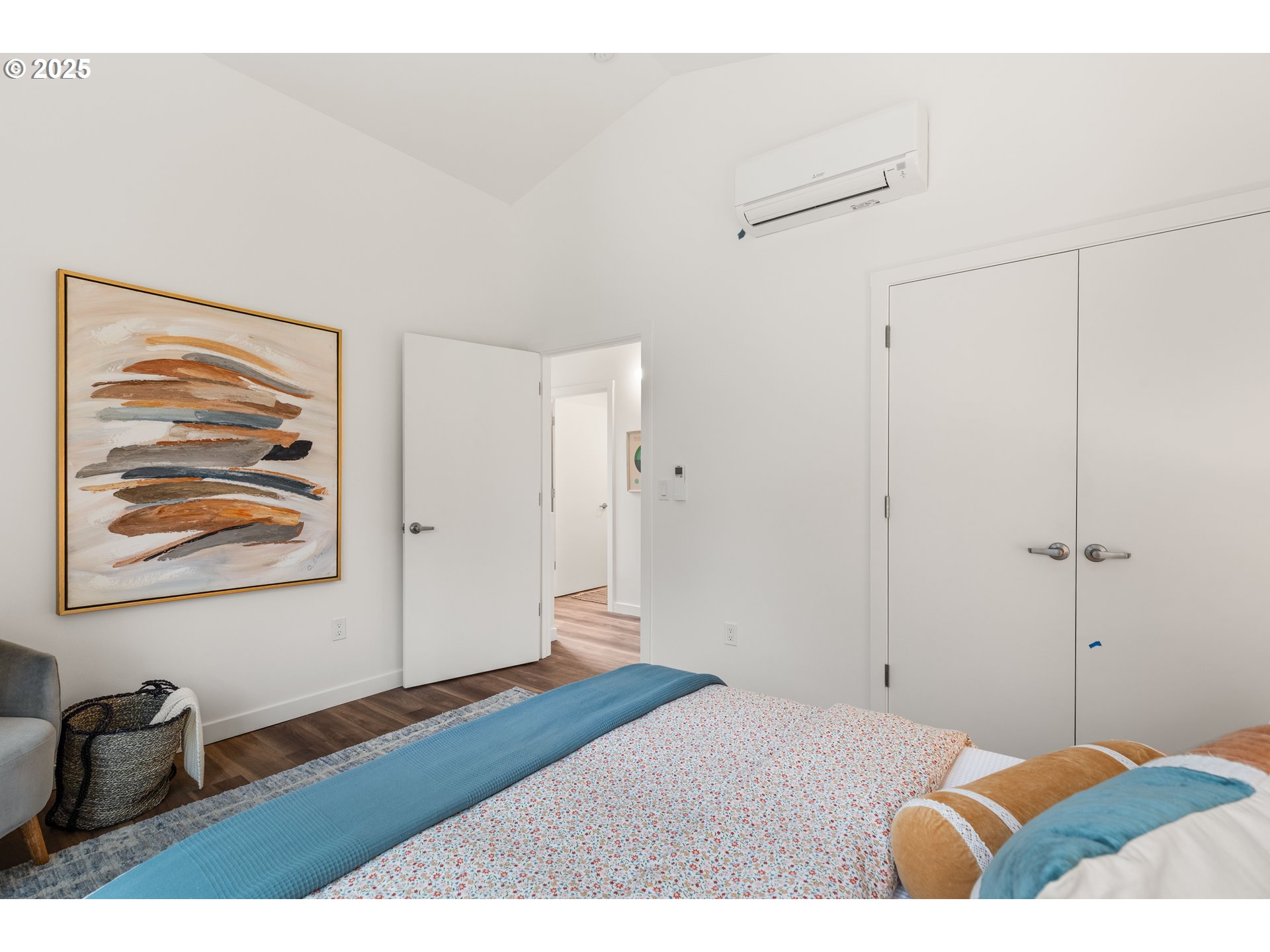 3732 Southeast Harvey Street, Unit 2 Milwaukie, OR 97222 - Photo 18 of 32 a bedroom with a bed and a painting on the wall