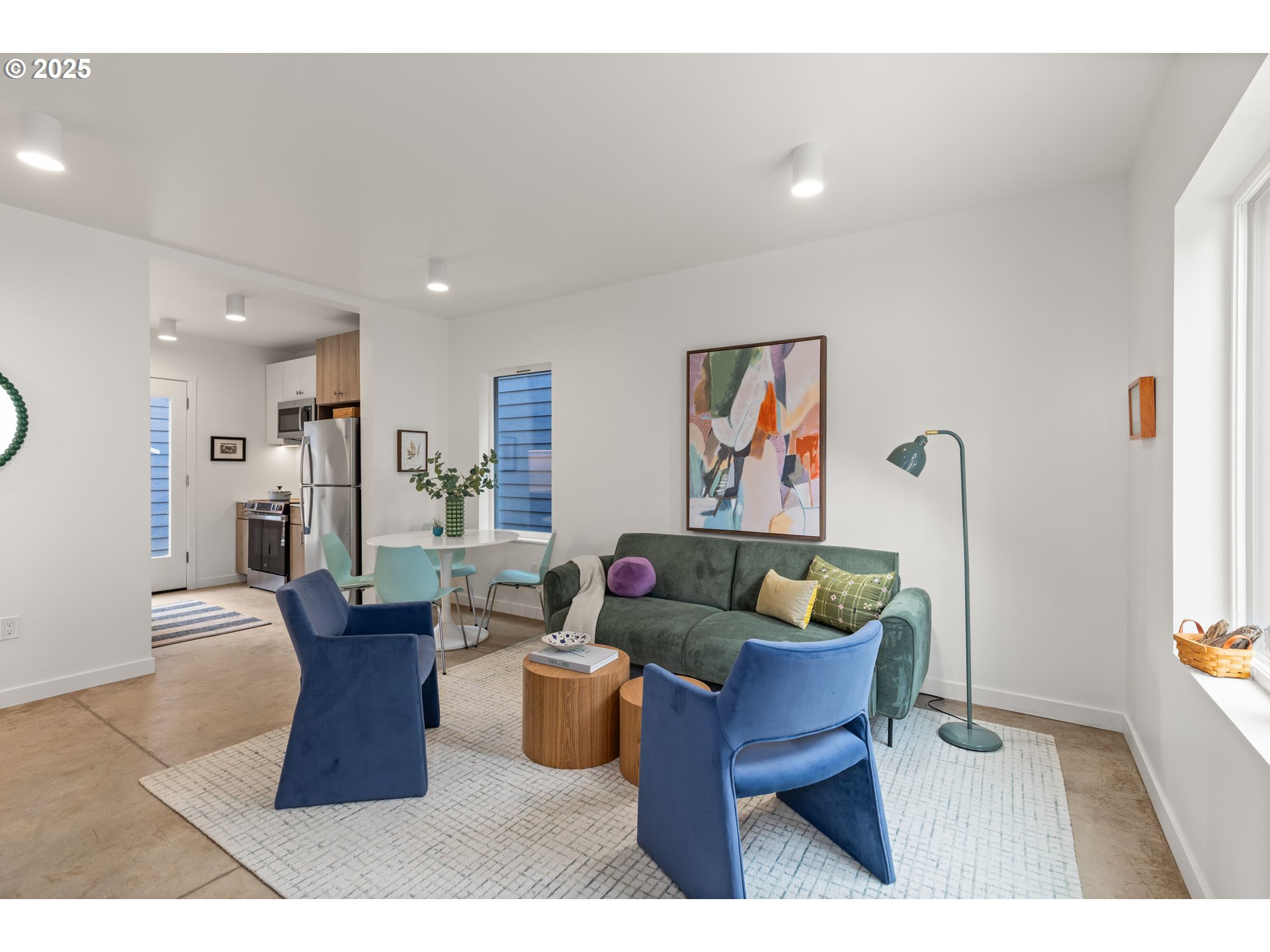3732 Southeast Harvey Street, Unit 2 Milwaukie, OR 97222 - Photo 2 of 32 a living room with furniture and a rug
