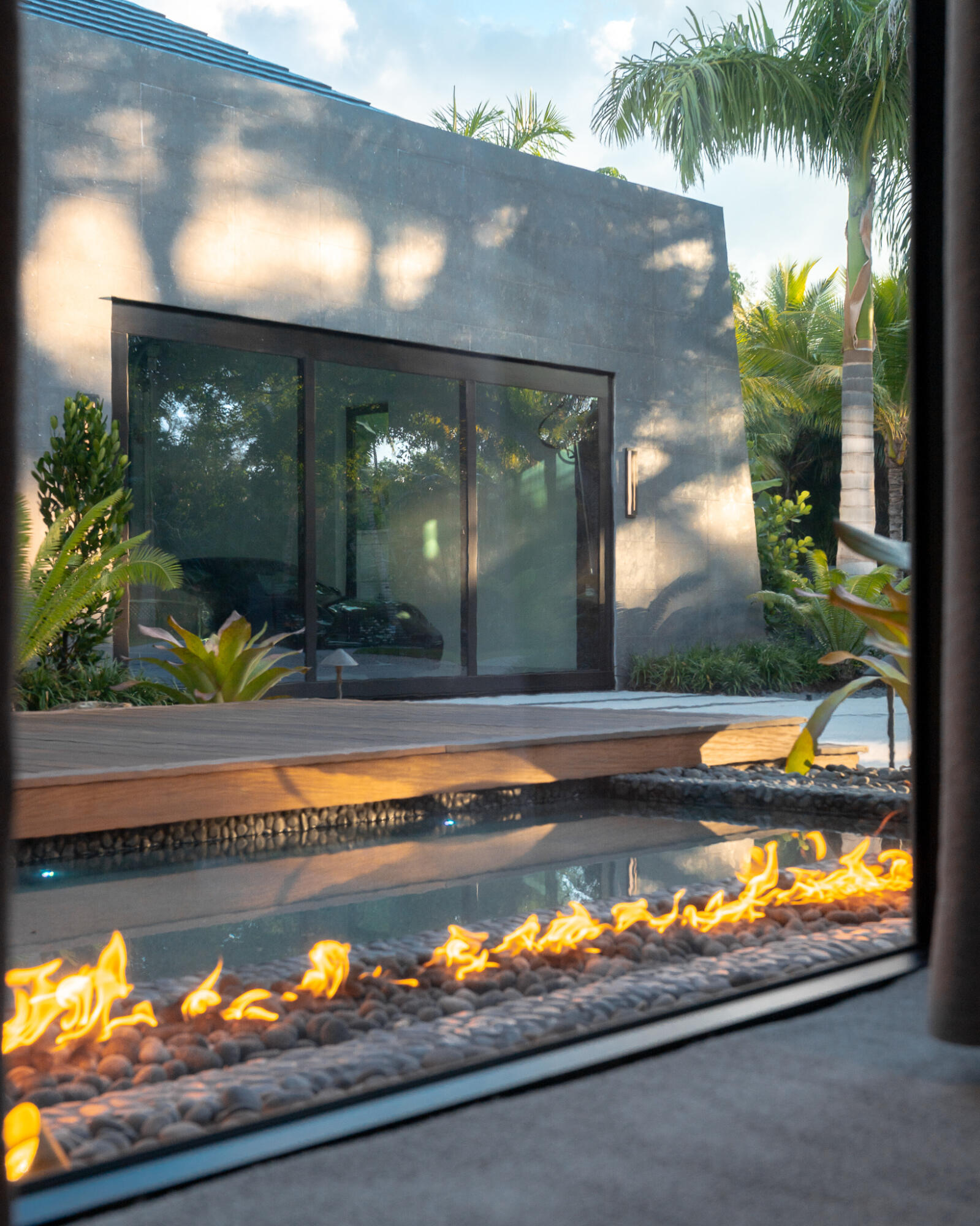 488 South Beach Road Jupiter Island, FL 33455 - Photo 25 of 54 a view of swimming pool from a outdoor space