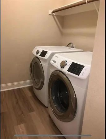 a utility room with dryer and washer