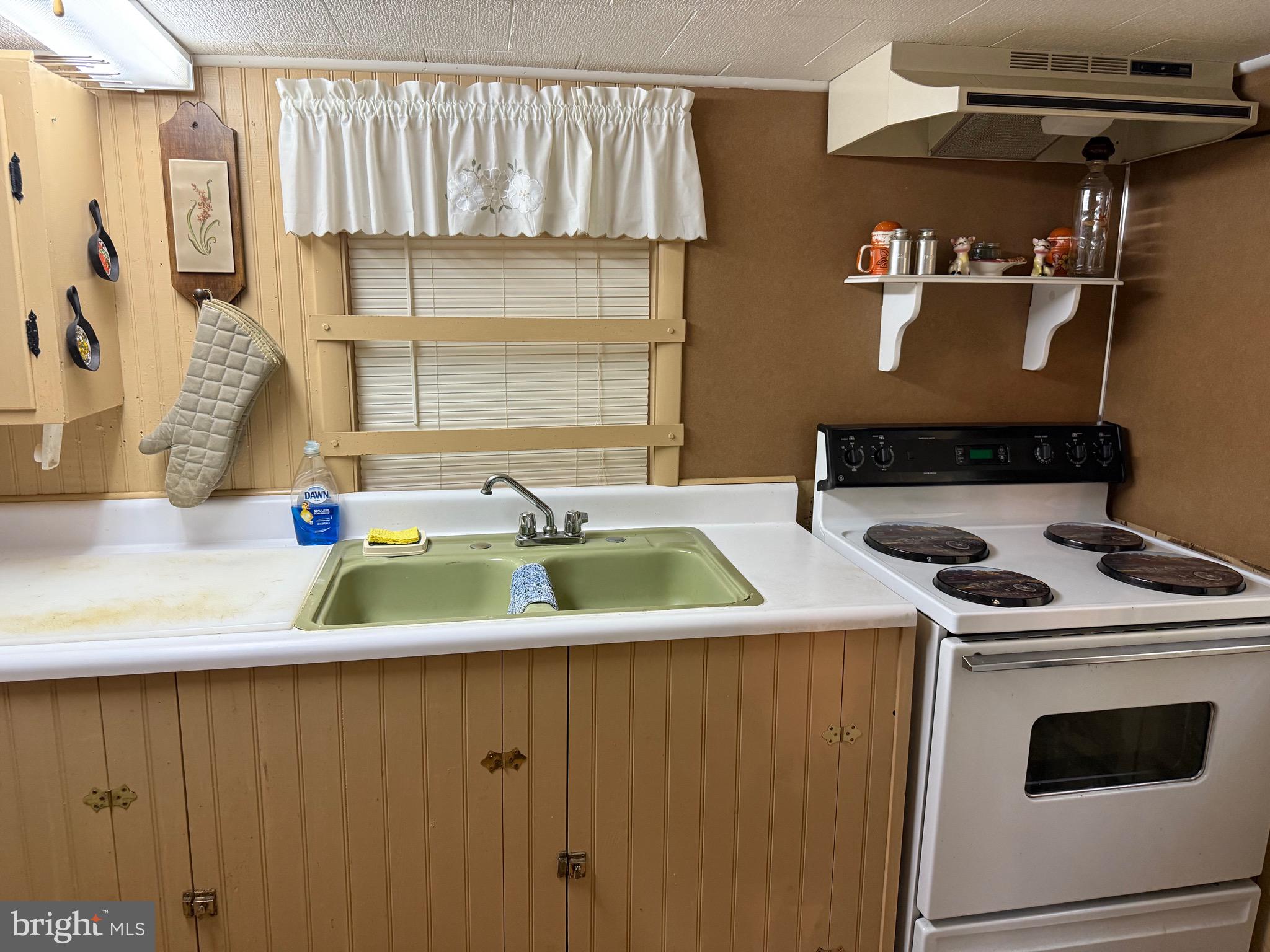 1-c401 Staley Road Waynesboro, PA 17268 - Photo 26 of 45 a kitchen with a sink a stove and a microwave