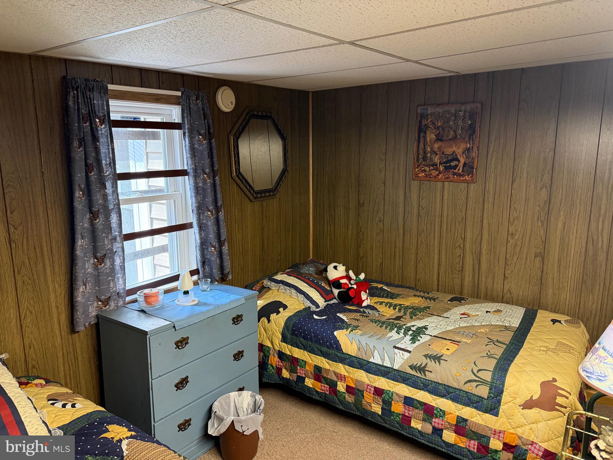 1-c401 Staley Road Waynesboro, PA 17268 - Photo 31 of 45 a bedroom with a bed and wooden floor