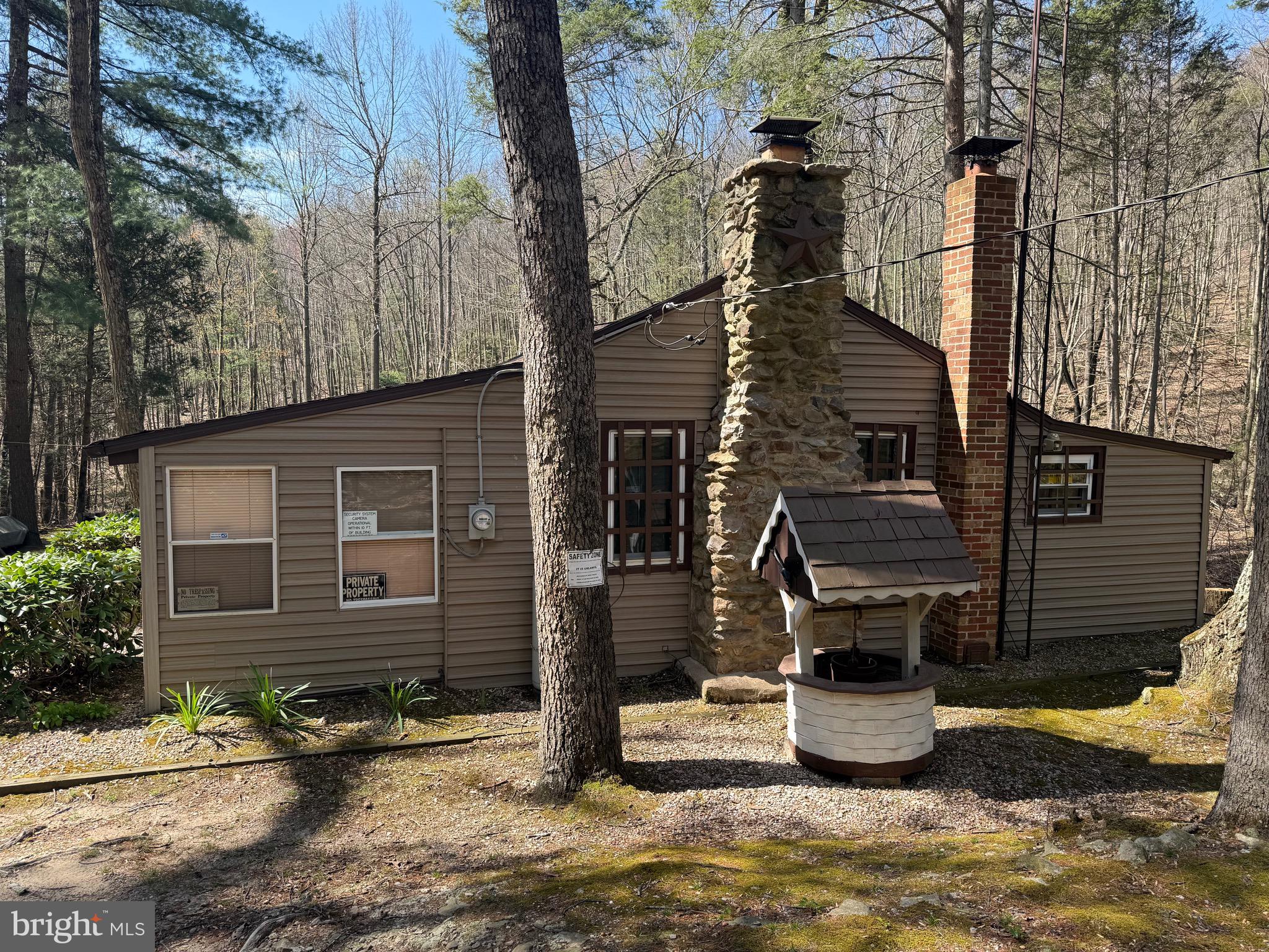 1-c401 Staley Road Waynesboro, PA 17268 - Photo 38 of 45 a backyard of house with barbeque grill and potted plants