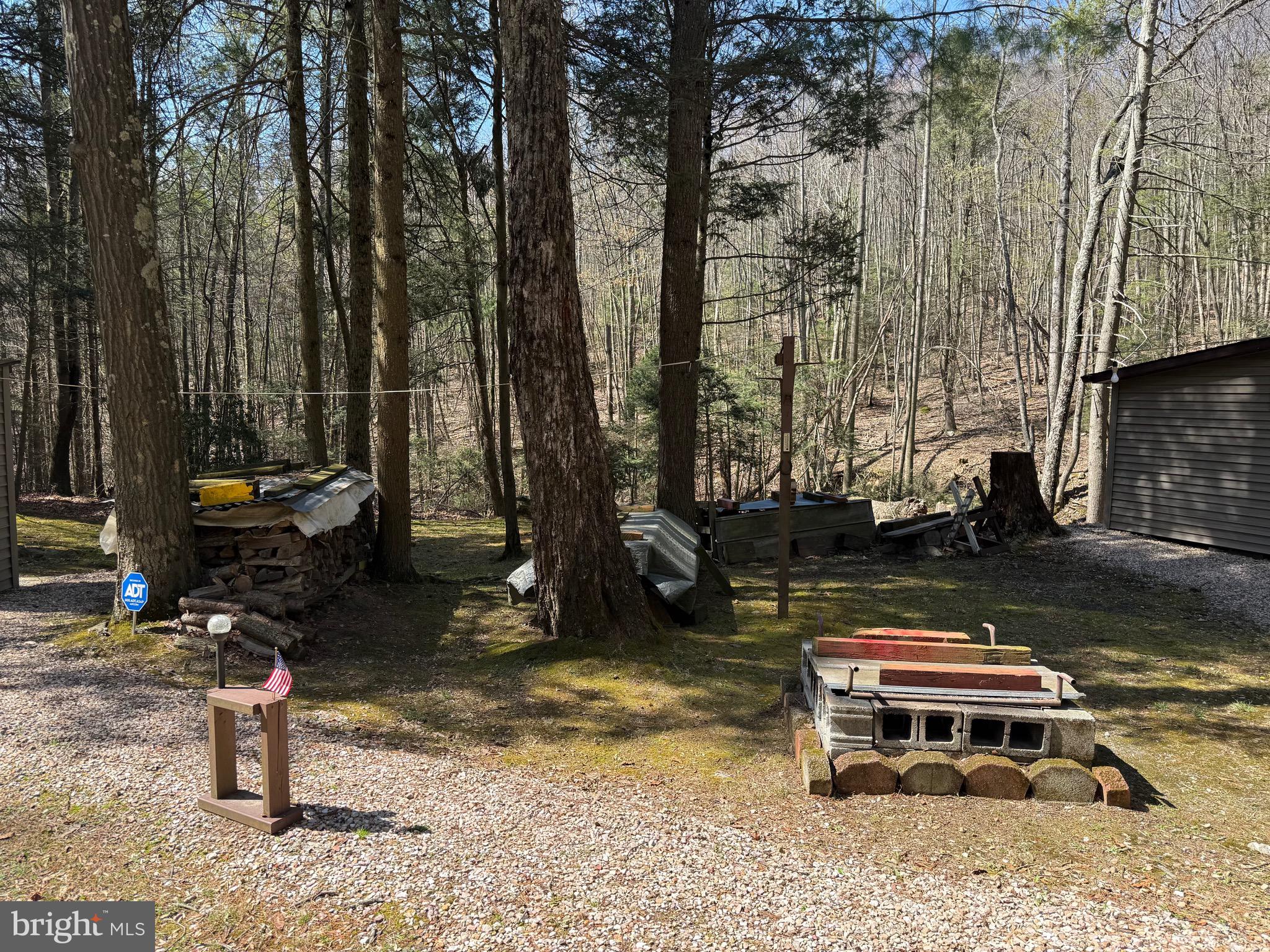 1-c401 Staley Road Waynesboro, PA 17268 - Photo 40 of 45 a backyard of a house with barbeque oven and outdoor seating