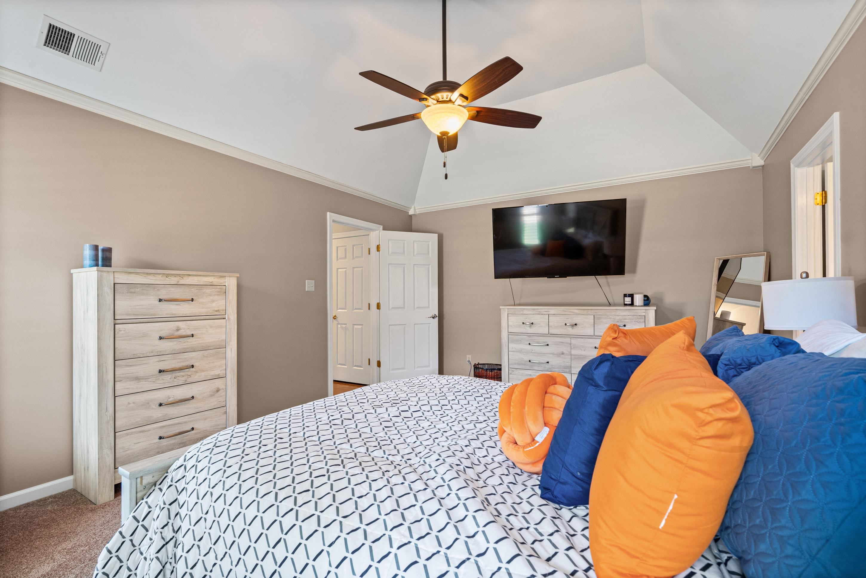 304 Spring Mill Road Collierville, TN 38017 - Photo 15 of 32 Vaulted ceiling with crown molding and ceiling fan