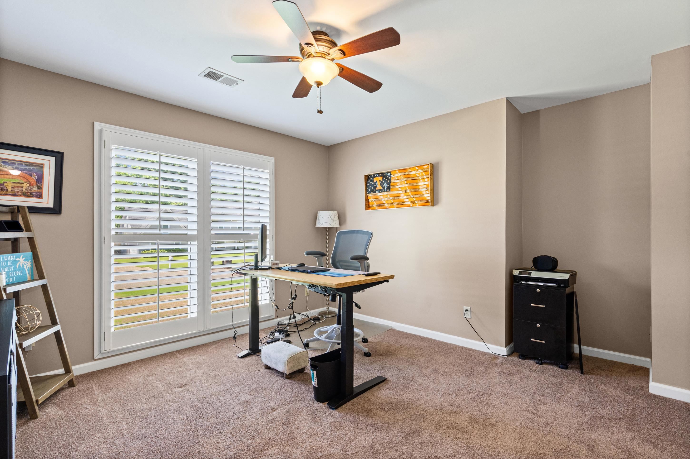 304 Spring Mill Road Collierville, TN 38017 - Photo 21 of 32 Room featuring a ceiling fan with integrated lighting, neutral wall tones, and plush carpet flooring