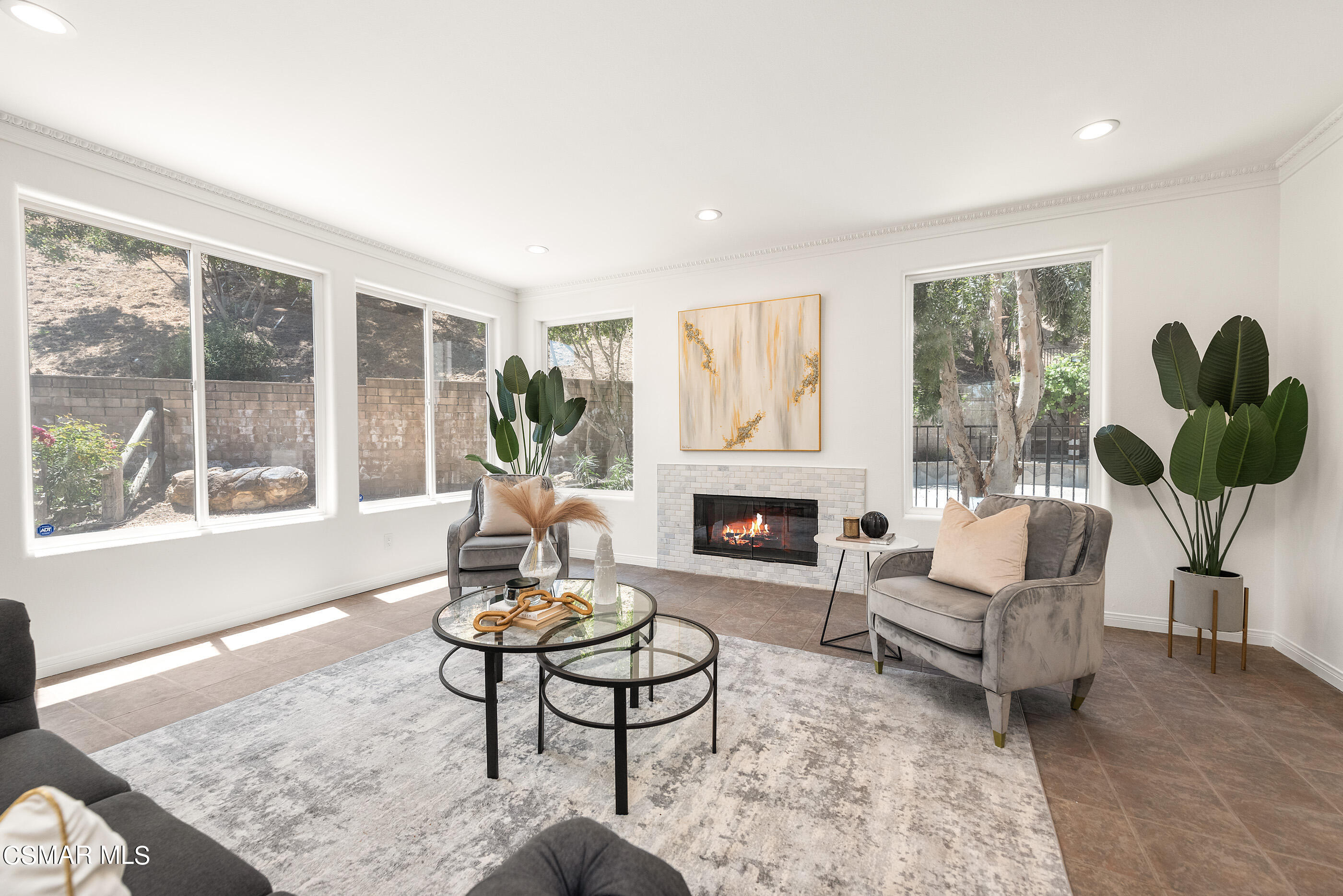 3877 Marks Road Agoura Hills, CA 91301 - Photo 14 of 53 a living room with furniture and a fireplace