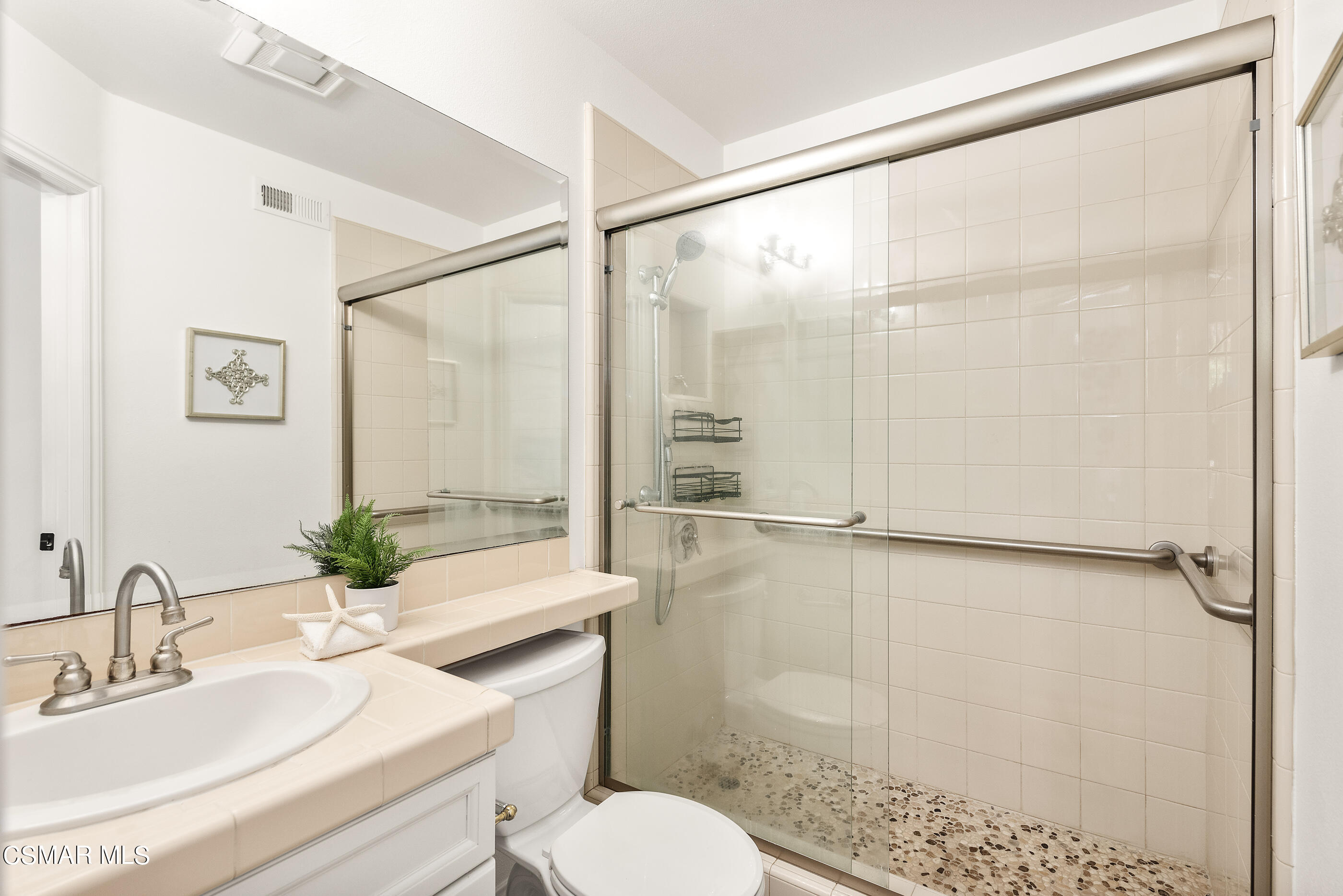 3877 Marks Road Agoura Hills, CA 91301 - Photo 18 of 53 a bathroom with a sink and a mirror