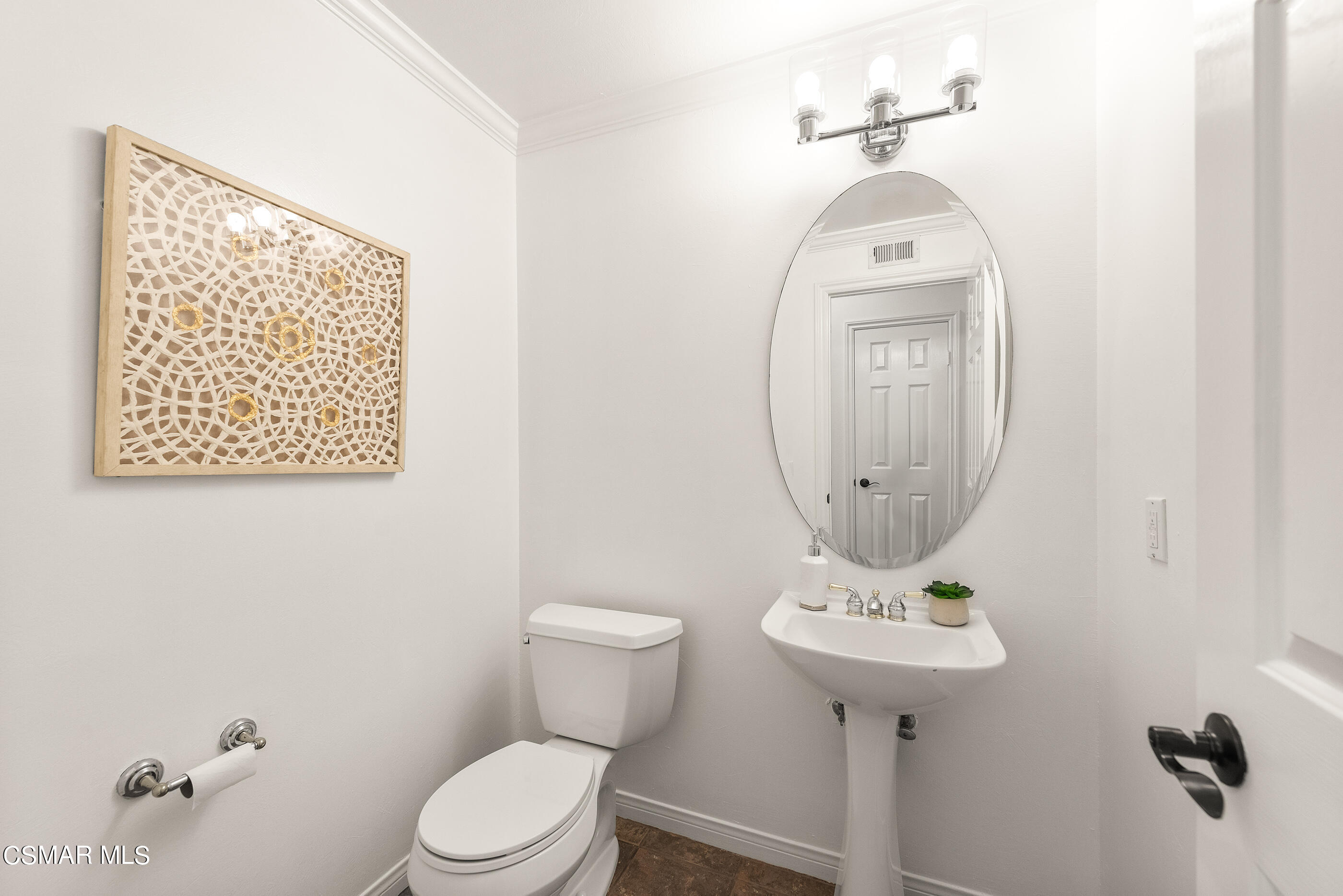 3877 Marks Road Agoura Hills, CA 91301 - Photo 19 of 53 a bathroom with a toilet a sink and mirror