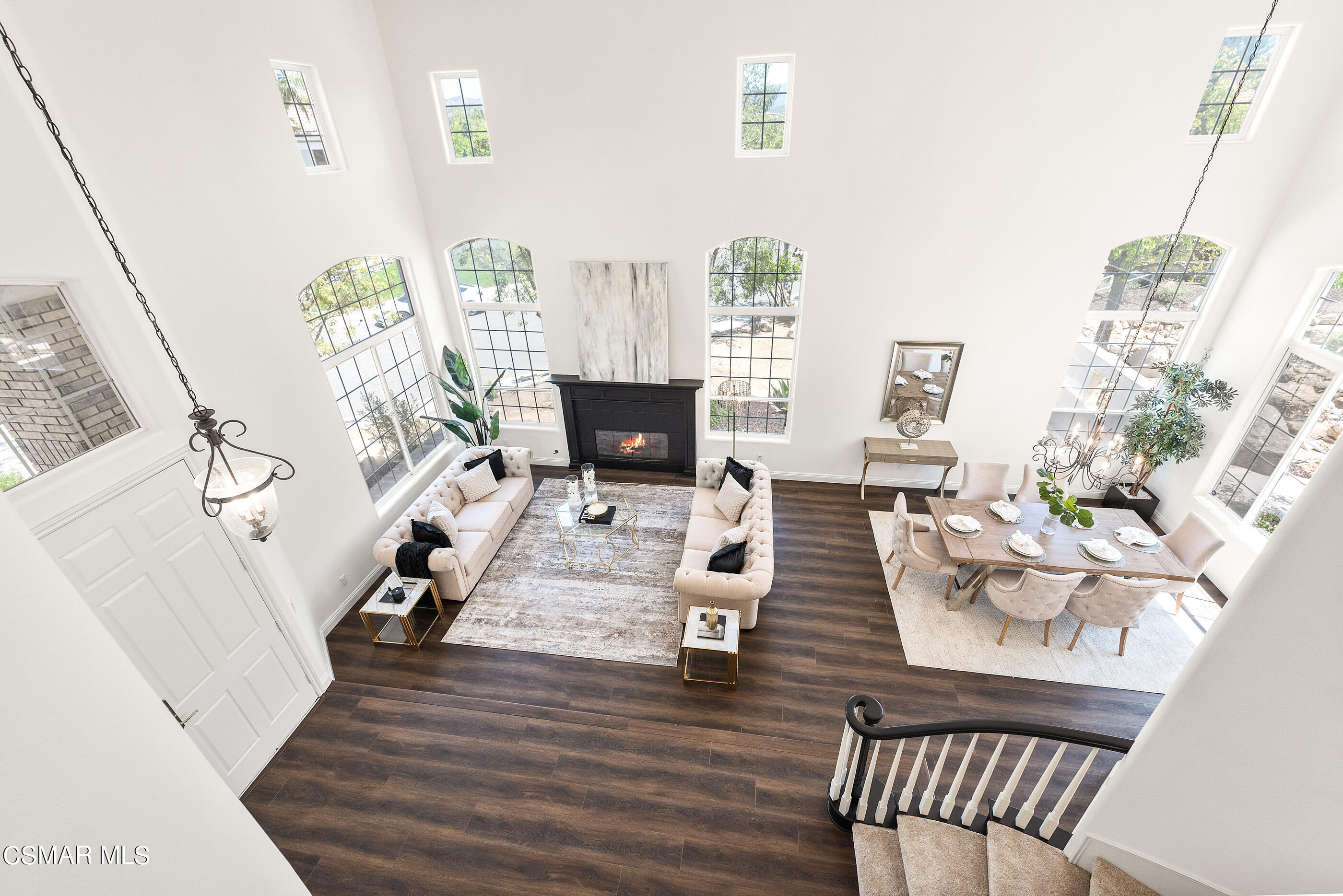 3877 Marks Road Agoura Hills, CA 91301 - Photo 22 of 53 a living room with furniture floor to ceiling window and wooden floor