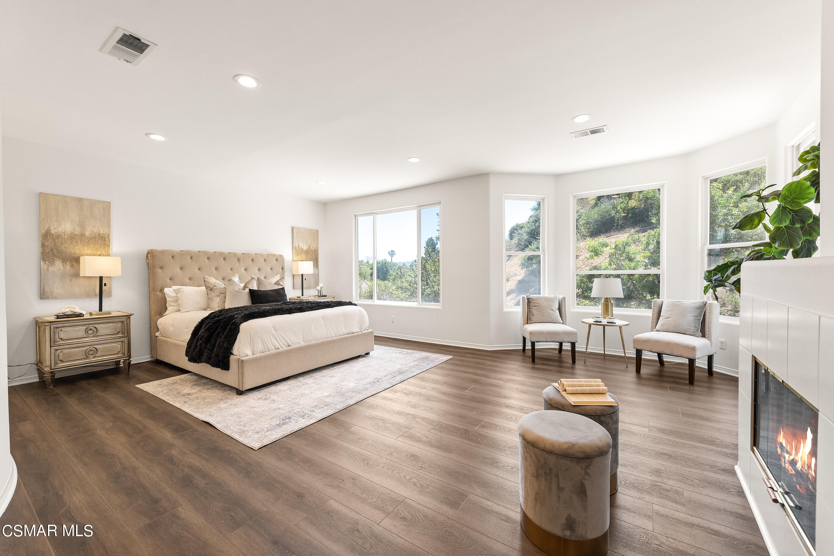 3877 Marks Road Agoura Hills, CA 91301 - Photo 23 of 53 a bedroom with furniture and a large window