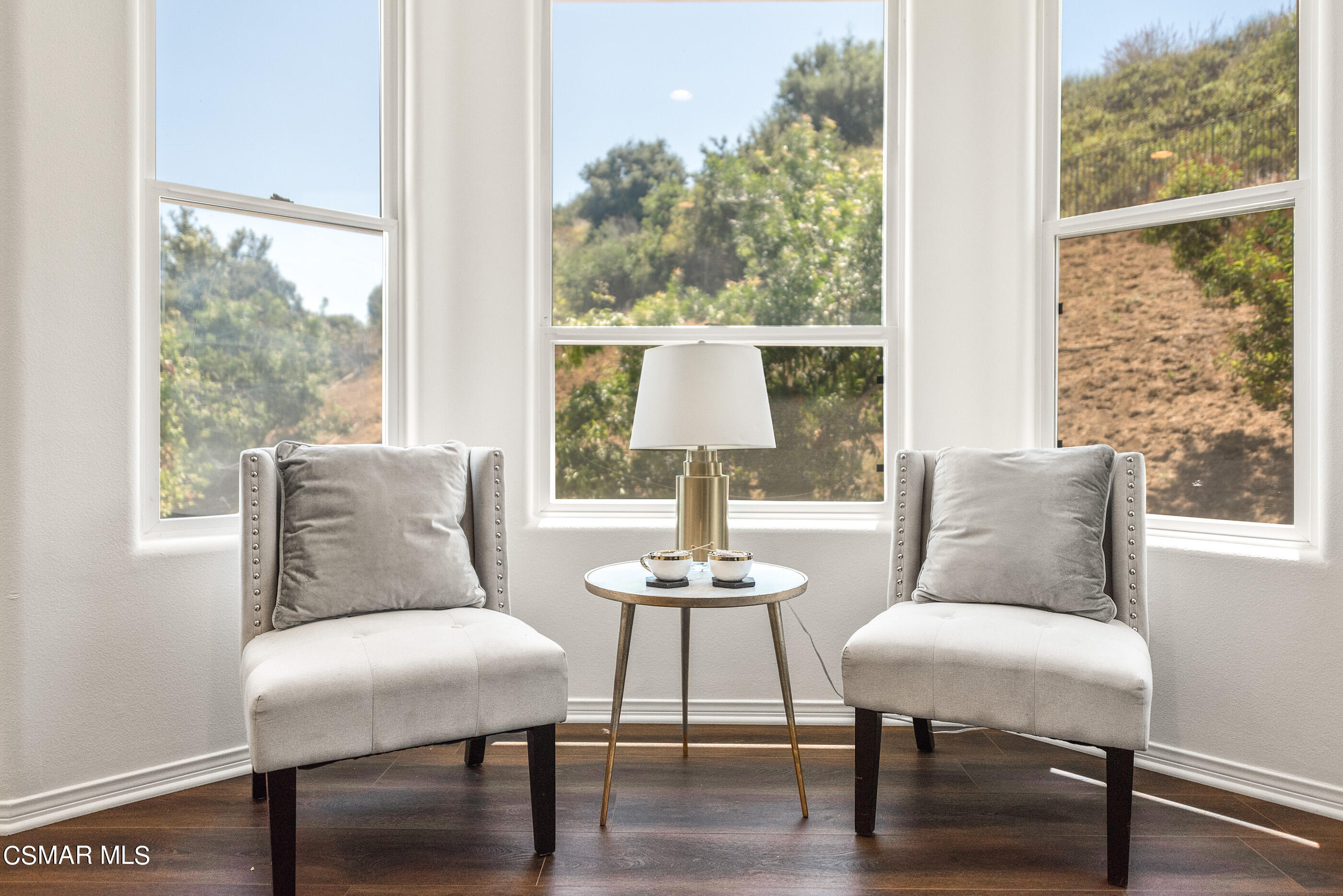 3877 Marks Road Agoura Hills, CA 91301 - Photo 26 of 53 a living room with furniture and a window