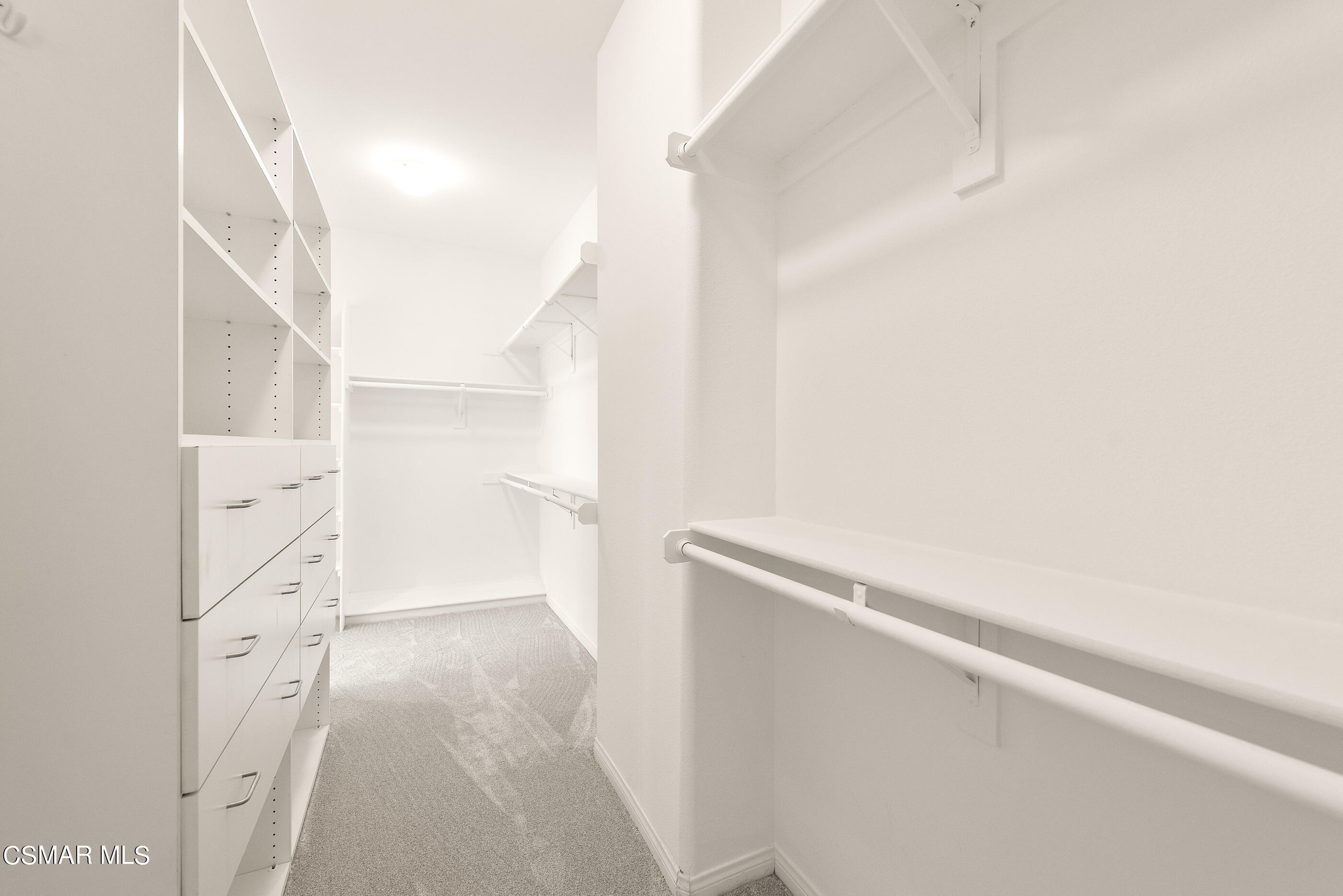 3877 Marks Road Agoura Hills, CA 91301 - Photo 28 of 53 a view of walk in closet with empty racks