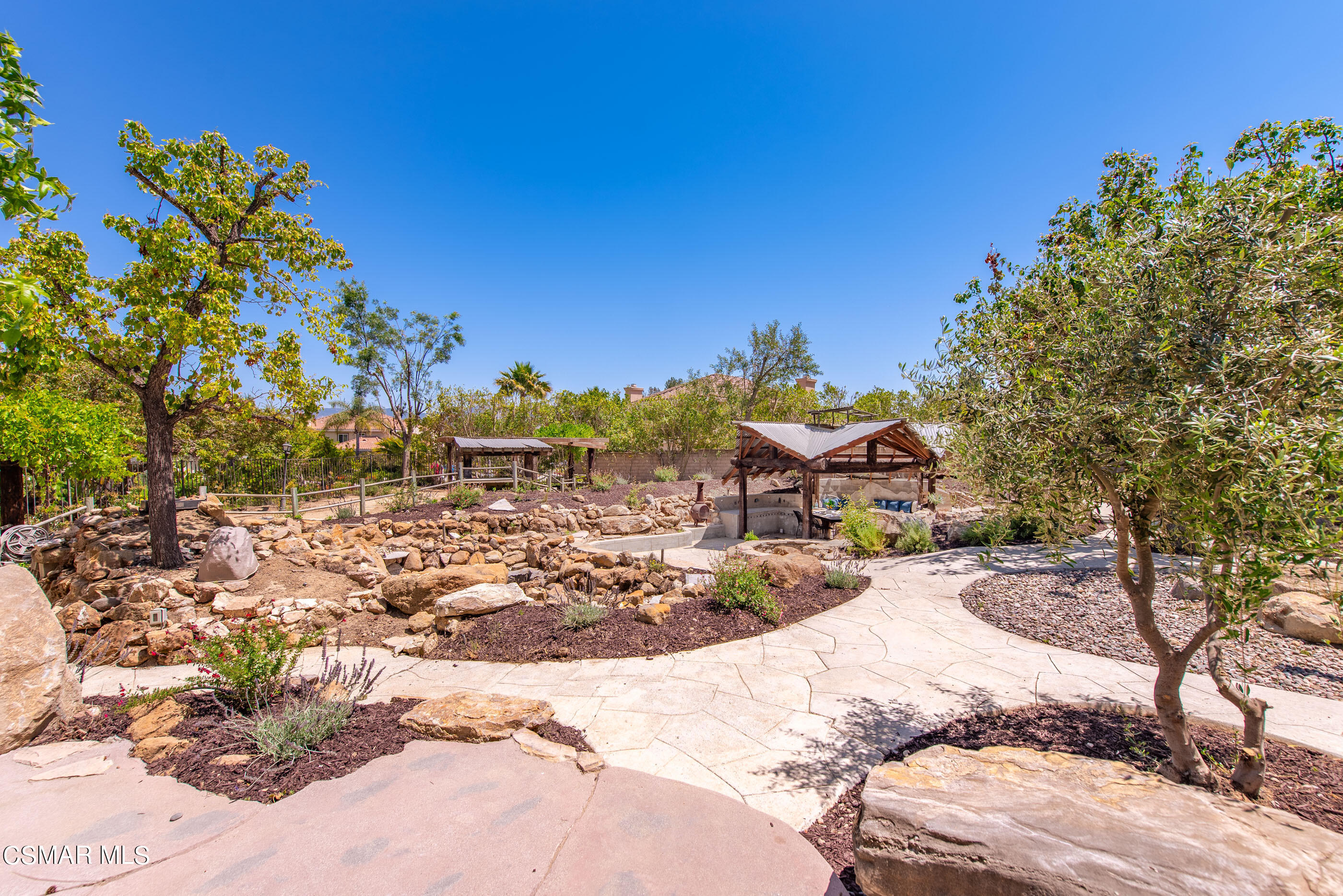 3877 Marks Road Agoura Hills, CA 91301 - Photo 38 of 53 a view of a house with a yard