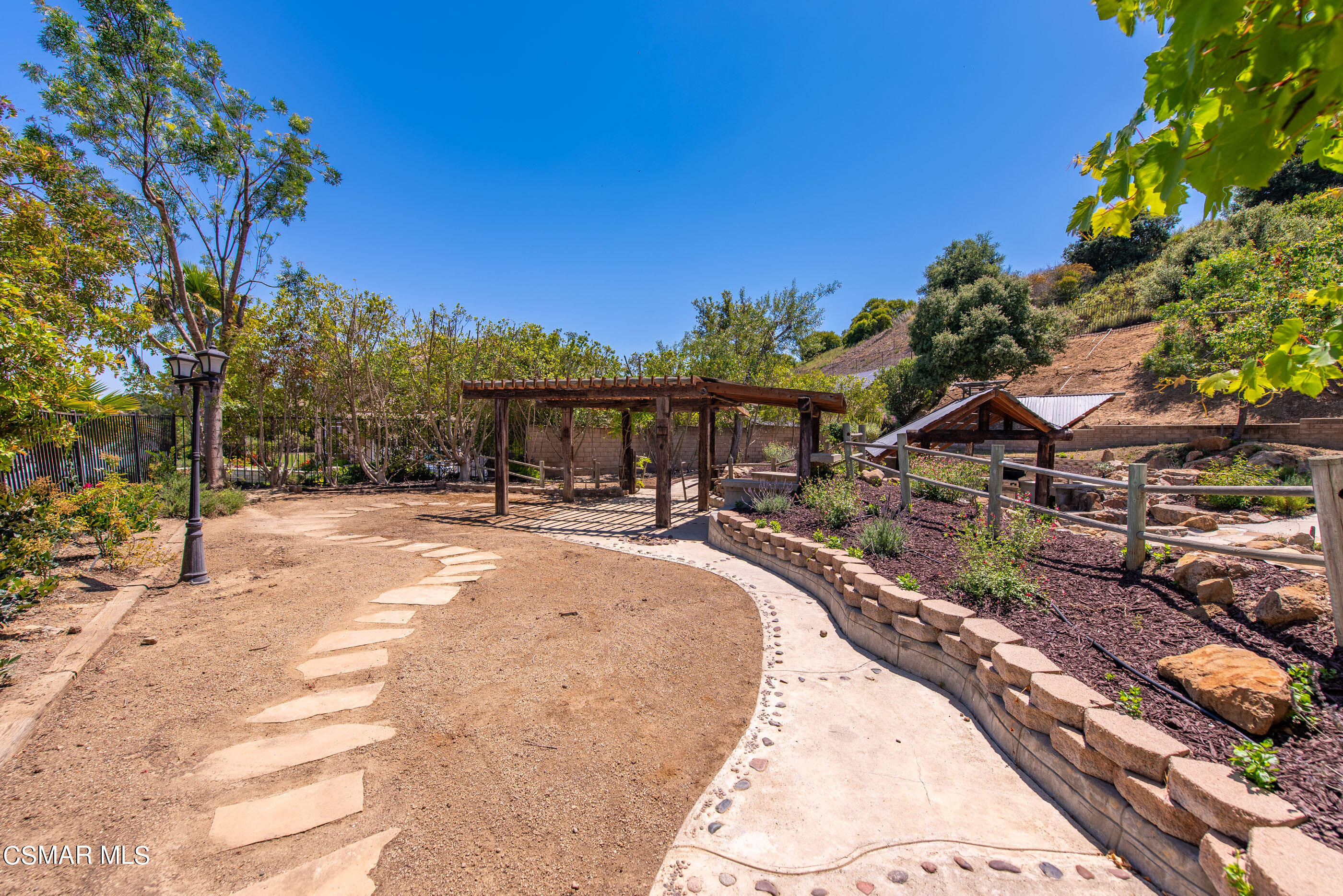 3877 Marks Road Agoura Hills, CA 91301 - Photo 40 of 53 a view of a swimming pool with a patio