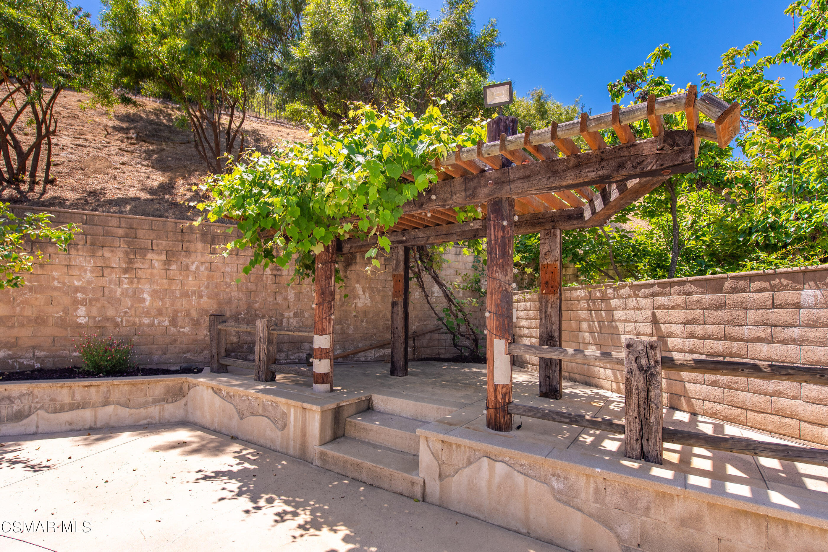3877 Marks Road Agoura Hills, CA 91301 - Photo 49 of 53 a front view of a house with a yard