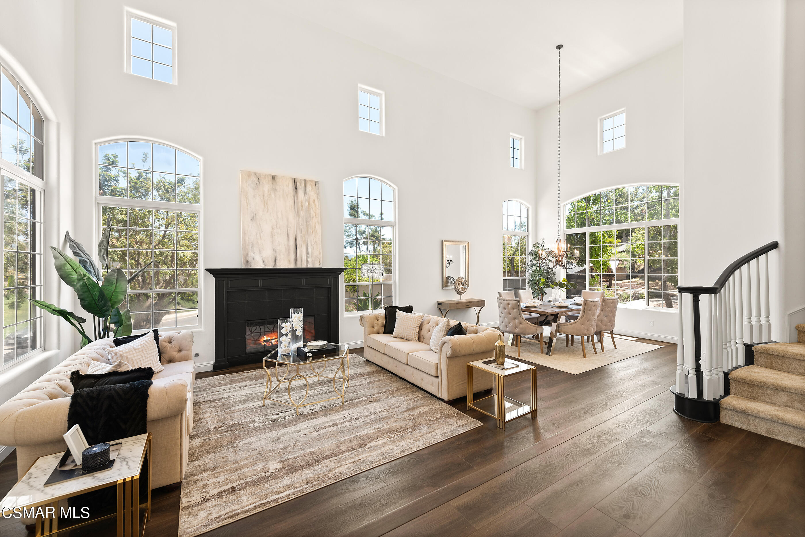 3877 Marks Road Agoura Hills, CA 91301 - Photo 5 of 53 a living room with furniture fireplace and a large window