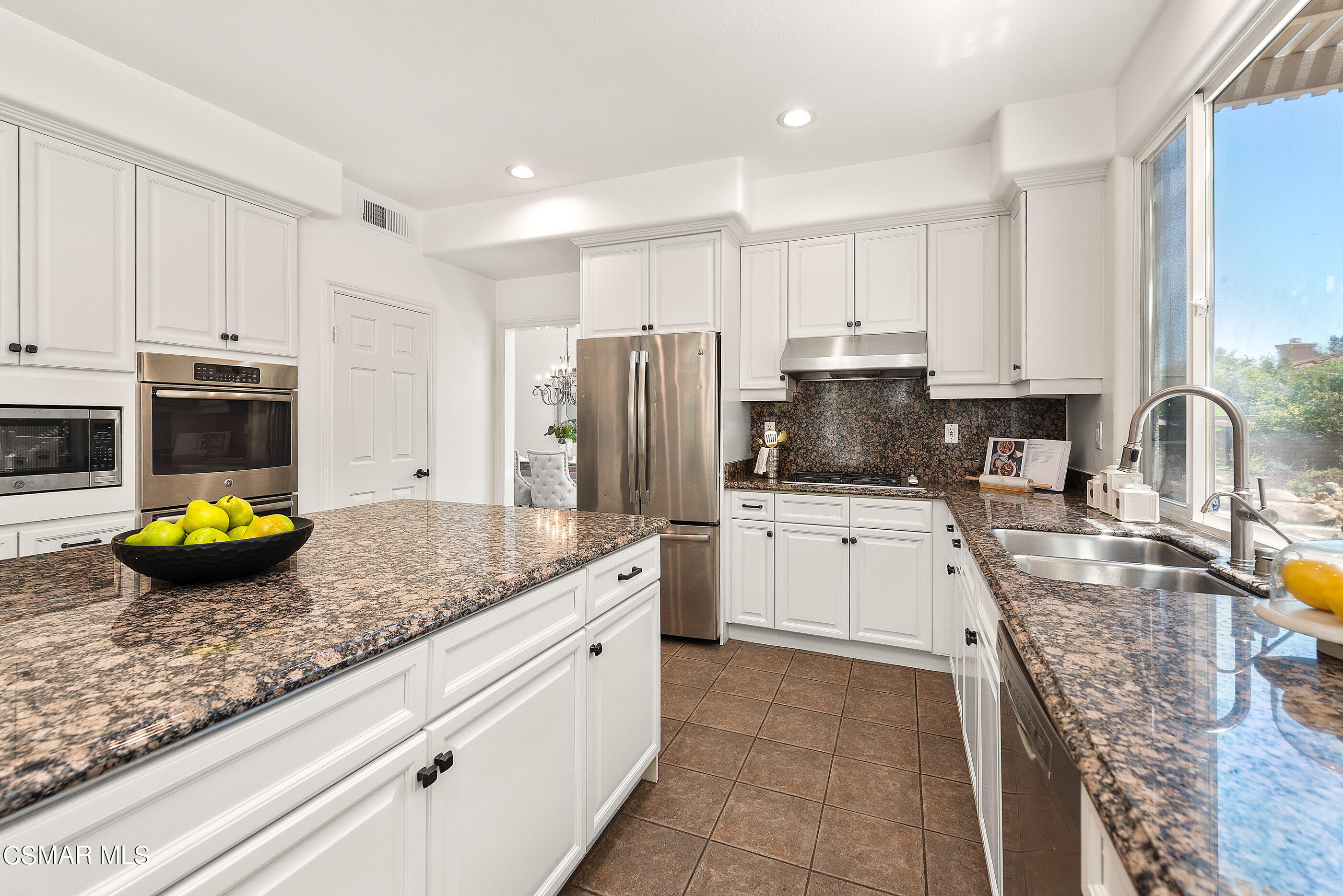 3877 Marks Road Agoura Hills, CA 91301 - Photo 10 of 53 a kitchen with refrigerator and stove