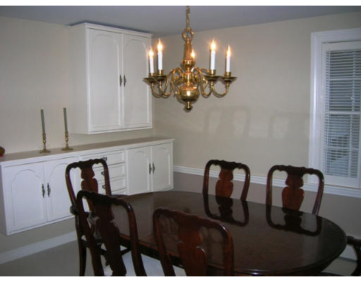 32 Avalon Road Needham, MA 02492 - Photo 3 of 8 a view of a dining room with furniture and chandelier