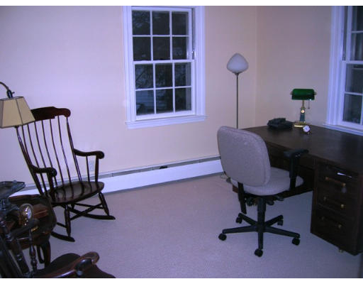 32 Avalon Road Needham, MA 02492 - Photo 6 of 8 a view of a workspace with furniture and a window