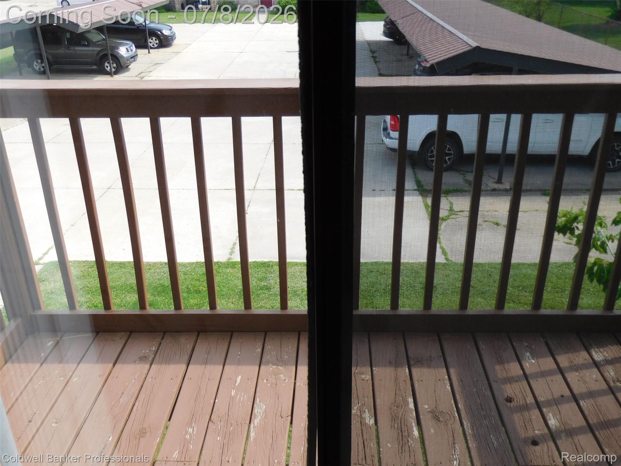 284 East 13 Mile Road Madison Heights, MI 48071 - Photo 6 of 21 Outdoor wooden deck with wooden railing