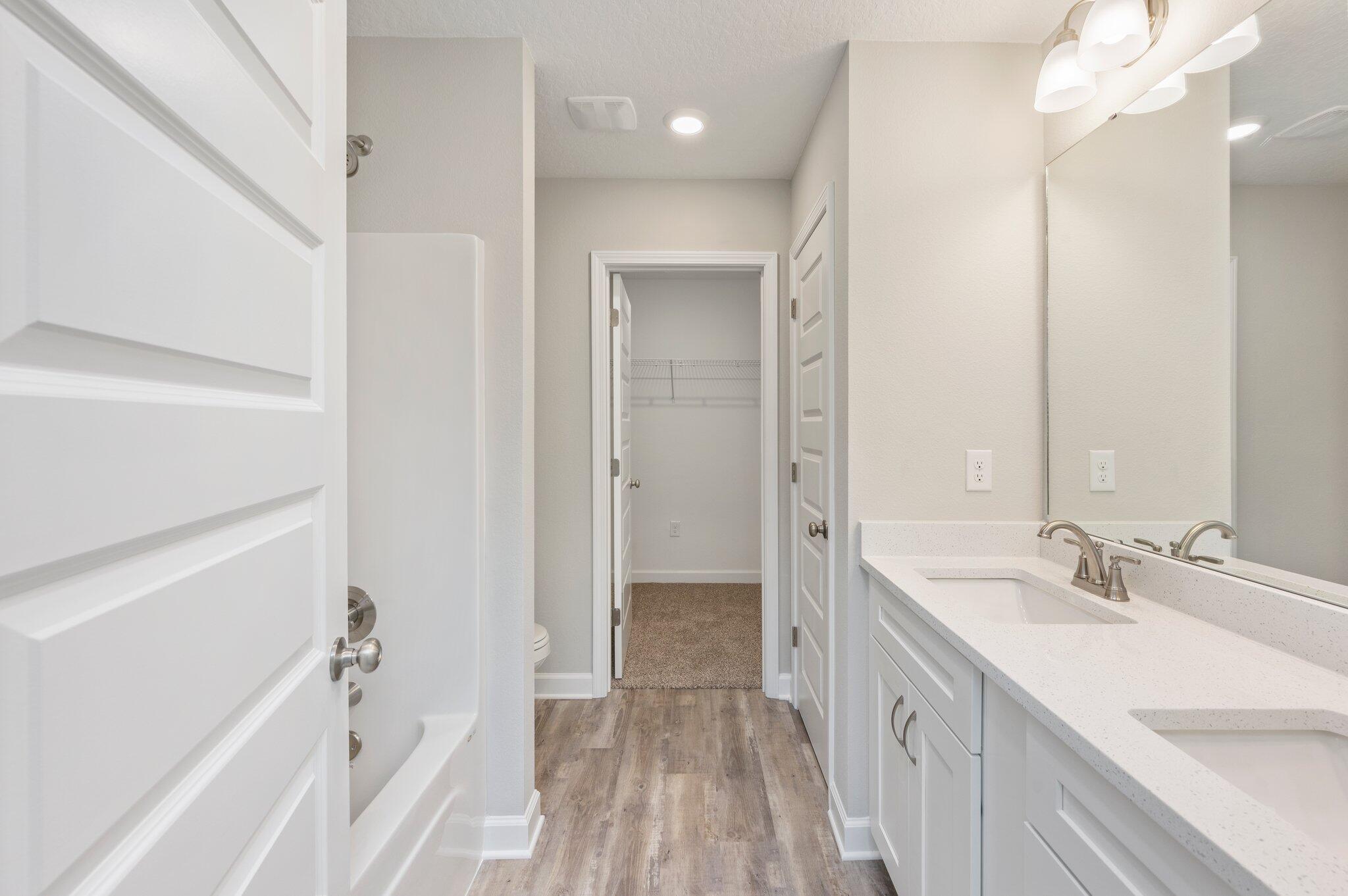 3158 Chestnut Street Crestview, FL 32539 - Photo 18 of 26 a bathroom with a double vanity sink and mirror