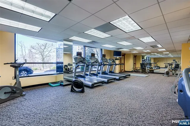 a view of a backyard with swimming pool