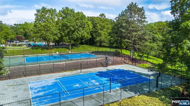 an aerial view of a house swimming pool patio and outdoor seating