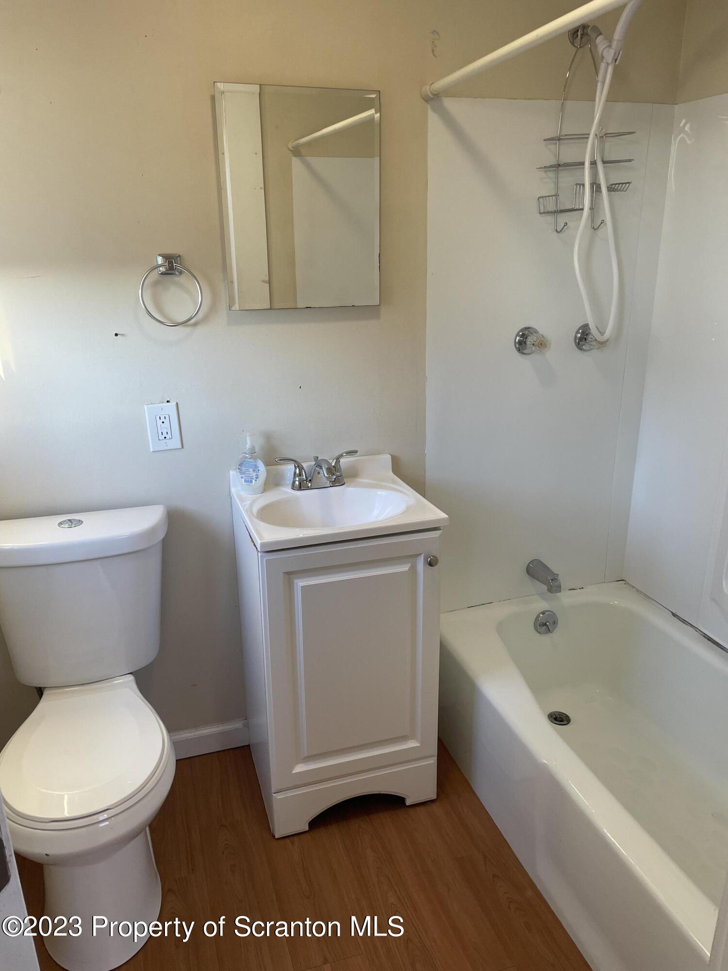 507 Church Street Jessup, PA 18434 - Photo 4 of 6 a bathroom with a sink toilet and shower