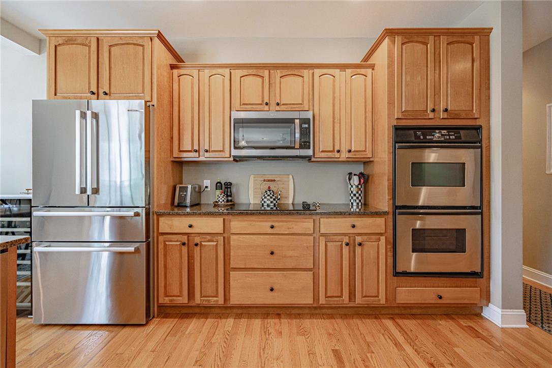 6000 Pond View Terrace Bath, PA 18014 - Photo 23 of 69 A well-appointed kitchen features warm wood cabinetry and a suite of stainless steel appliances.