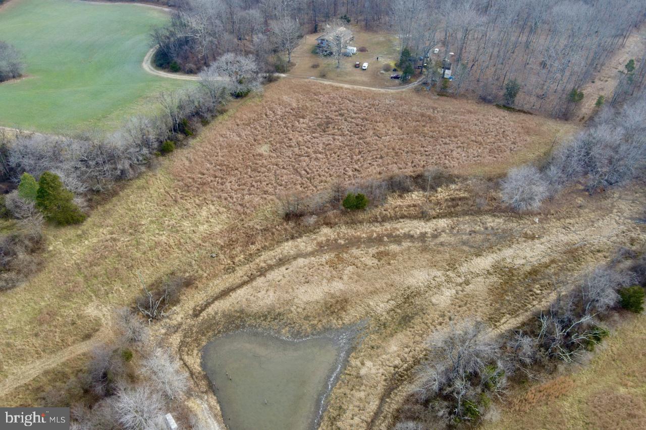 7389 Leeds Manor Road Marshall, VA 20115 - Photo 32 of 33 a view of a dry yard with wooden fence