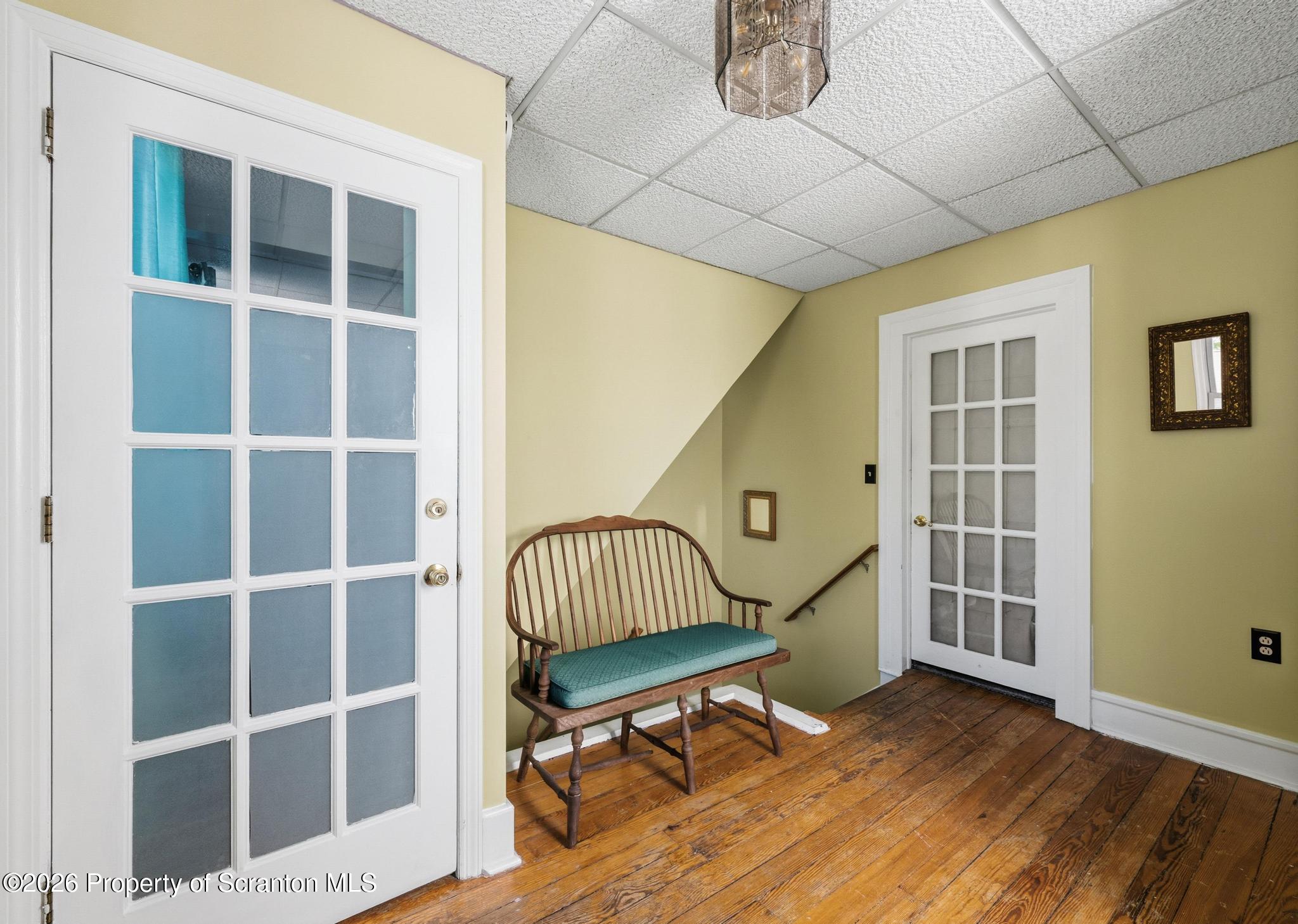 518 Prospect Avenue Scranton, PA 18505 - Photo 41 of 59 a view of staircase with wooden floor and a window