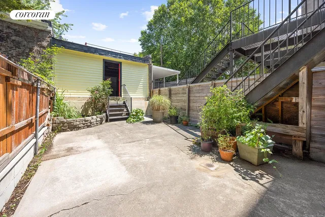a bathroom with a toilet sink and shower
