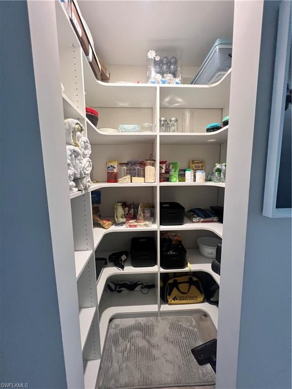 473 12th Avenue South, Unit B6 Naples, FL 34102 - Photo 5 of 10 a room with wooden floor