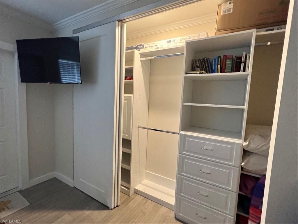 473 12th Avenue South, Unit B6 Naples, FL 34102 - Photo 6 of 10 a view of walk in closet